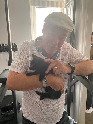 Grandad having fun with one of the kittens