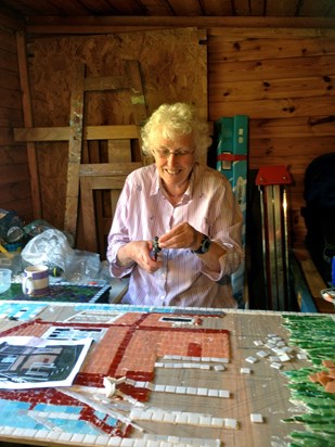 In Carolee's Shed/Studio working on a mosaic way marker for the Brampton Valley Way