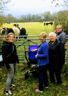 Jane, Pat, Tim and Mary out for a walk with Molly in pram