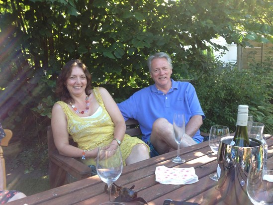 Dave and Debbie at our summer barbeque. Shame about the empty glasses!