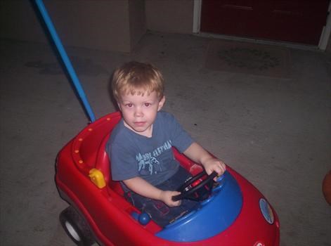 Cayden in his fav car