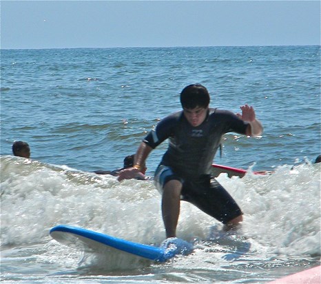 He was the first one to get up on the surf board, nice form Jack!