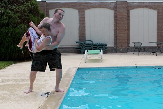 Tossing Jake in the pool