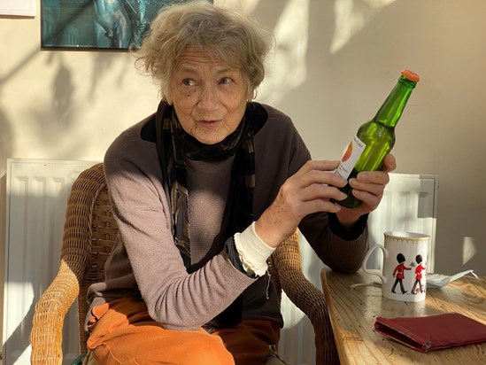 Christine shows the cider that is made from her apples on 2. November 2021.