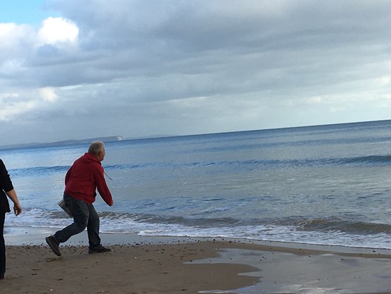 David skimming stones on Bournemouth beach on Sunday
