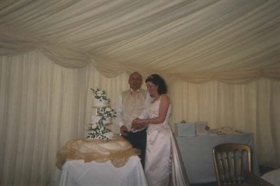 Mum and Dad's Wedding - cutting the cake 2