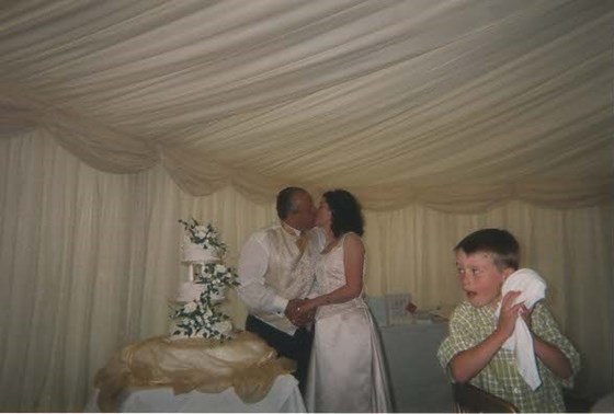 Mum and Dad's Wedding - cutting the cake 3