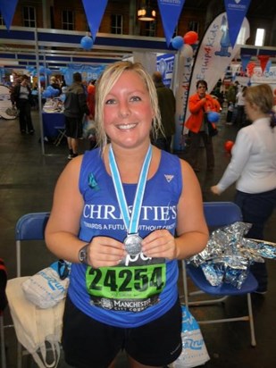 Nat with medal for completing Manchester 10k 2009