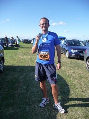 Rob with his medal after completing the 13 mile Great North Run 2009