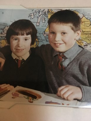 93D853F5 C83D 4EF4 ACBB EA849E2AB0BE  John in primary school with his sister