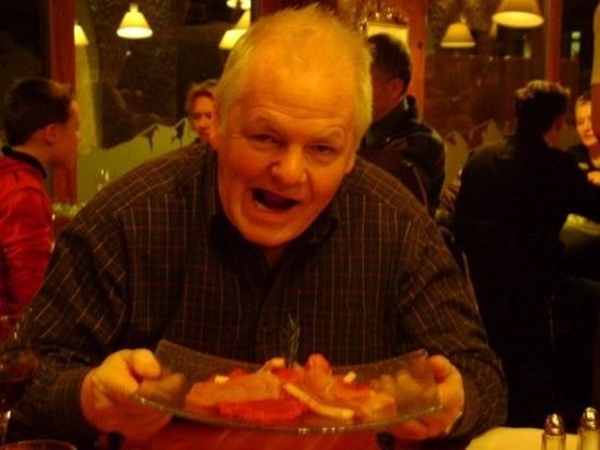 Derek with a Plate of Raw Meat