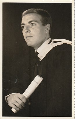 Alan with one of his two university degrees (plus one very smart haircut)