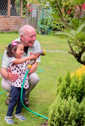 Fun with the garden hose with granddaughter Millie