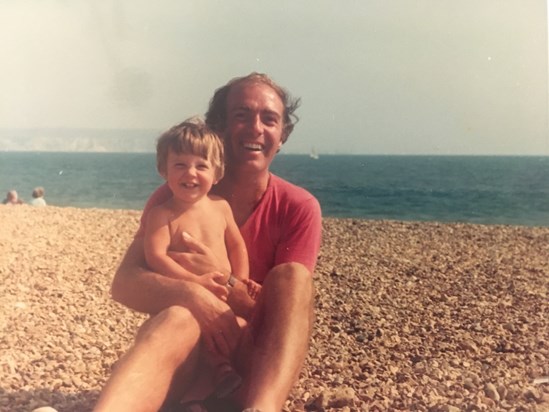Alan with young Liz on holiday on the coast