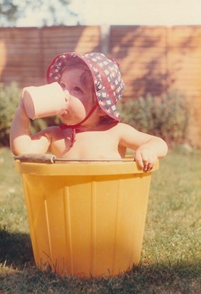 Liz in a bucket - the perfect way to cool off in a hot summer of 1976