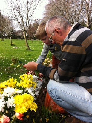 1 Helping Josh put flowers down for his Mother  08/04/2015
