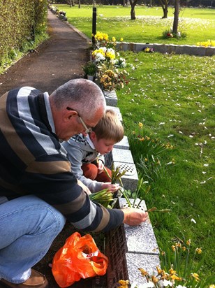 3 Helping Josh put flowers down for his Mother  08/04/2015