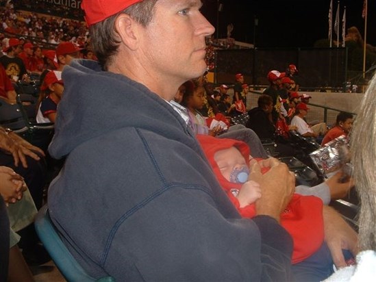 Jesse & Uncle Brad at Angel stadium.  Auntie Teresa finally let someone else hold Jesse for a bit!