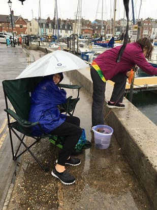 Catching crabs in the rain