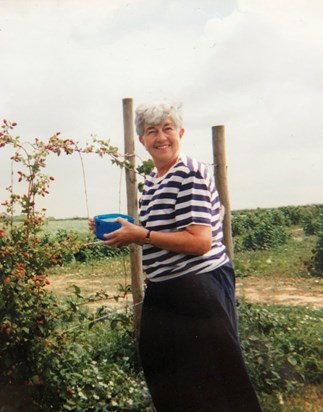 Mum berry picking