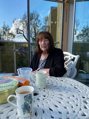 Mum sitting on her balcony - 20th Oct 2020 