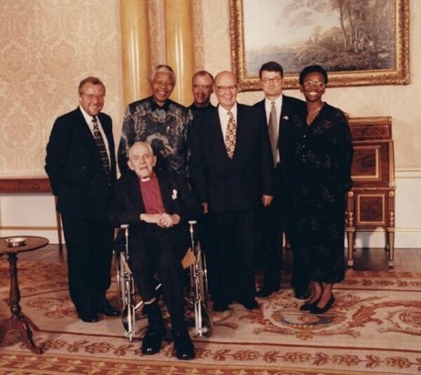 Nelson Mandela visits Buckingham Palace 1996, ACTSA team with Bob Hughes (centre) and Richard Caborn MP, Archbishop Huddleston CR (seated) and Fr Nicolas Stebbing CR (rear)