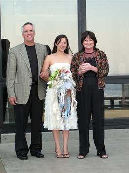 Happy parents escorting the bride-to-be