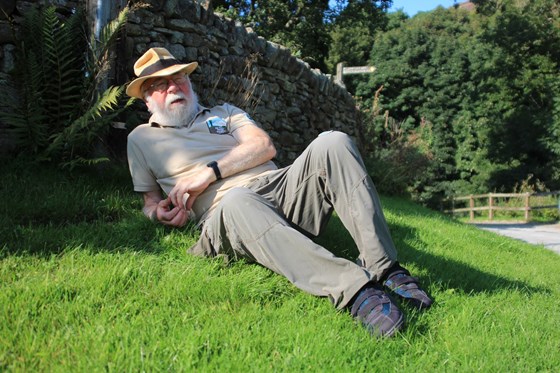 On the green outside his house in Edale