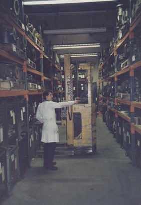 John at work in his famous white foreman smock, IMI Stores with Pi Eye prob 1982