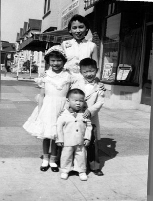 Mom, Becky, Alan, & Jimmy @ Chew's Laundry 1956-7