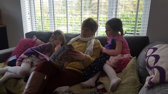 Paula enjoying reading time with Alissa & Erin