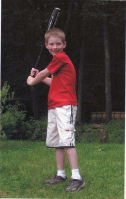 Nate playing baseball at Uncle Dana's, Mass 2002(?)