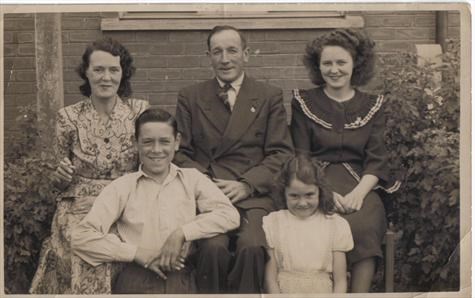 Dad with his family in about 1947
