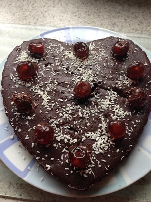 Mommy made a cherry chocolate cake for Mother's Day. 