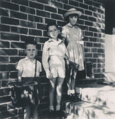 Tony (middle) with younger brother Paul and twin sister Jenny