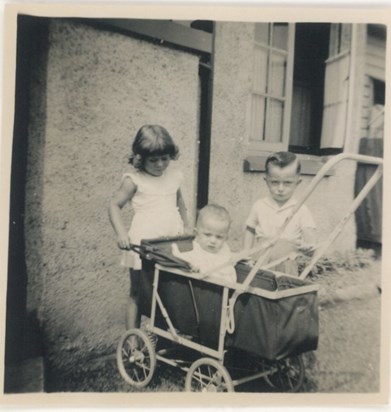 Tony (back right) with twin sister Jenny and younger brother Paul in pram