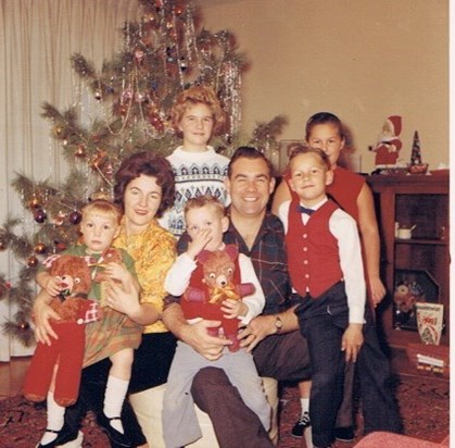Mary Jo with Moss and family, 1961.