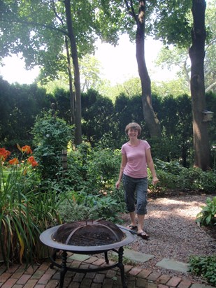 Denise  in her lovely garden in Larchmont