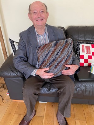 Dad with the crochet cushion I made him. 