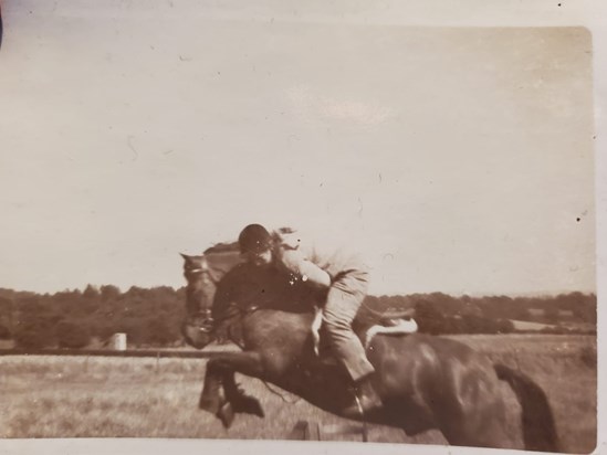 Lee in her happy place, with the horses