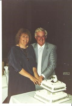 Cutting Silver Wedding cake in 1985