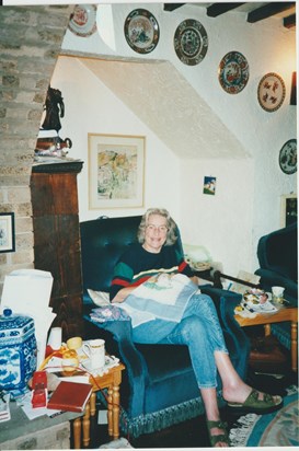 Ann at home, sewing