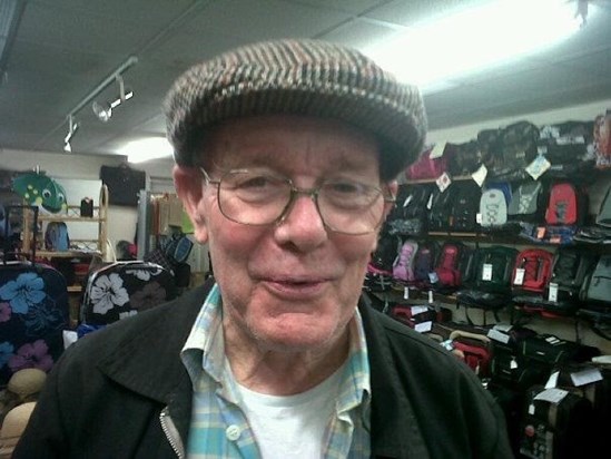 Trying on hats with Grandad in Somerset 2011