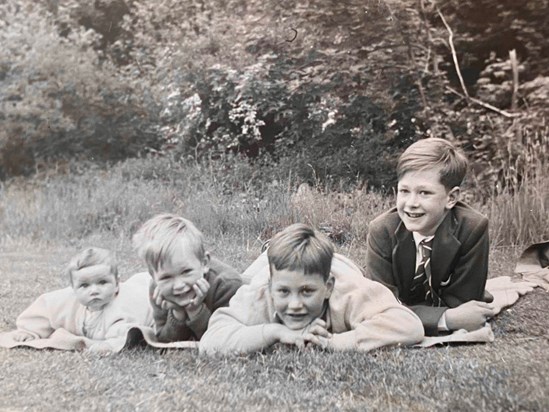 Peter with his two older brothers and his little sister