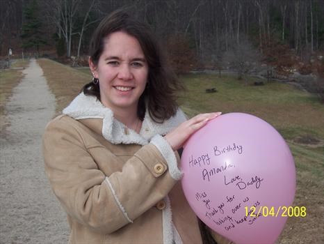 Mommy holding the other balloon!