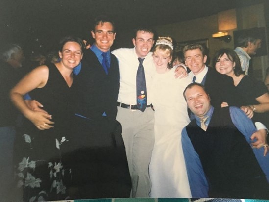 Adrian helping Andy and Tina enjoy their wedding in 1998