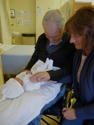 Grandad meets his first grandchild, Thea. September 2013