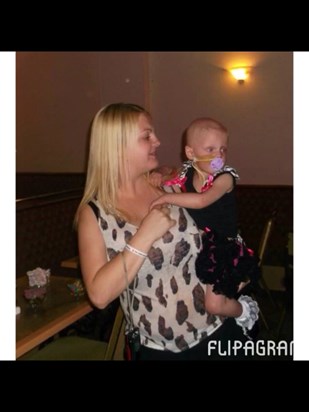 Millie at her 2nd birthday party with her mummy
