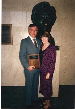 1988 Southern California Defense Trial Lawyer of the Year!  Ed with his award and Vickie -photo sent