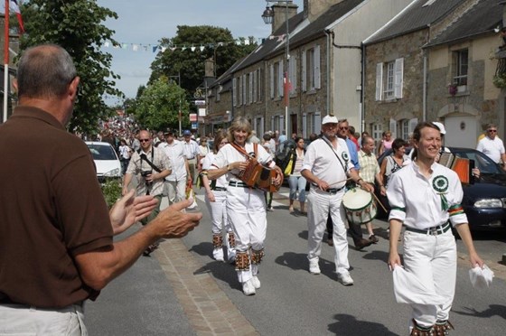 Drumming for Windsor Morris in a procession in France